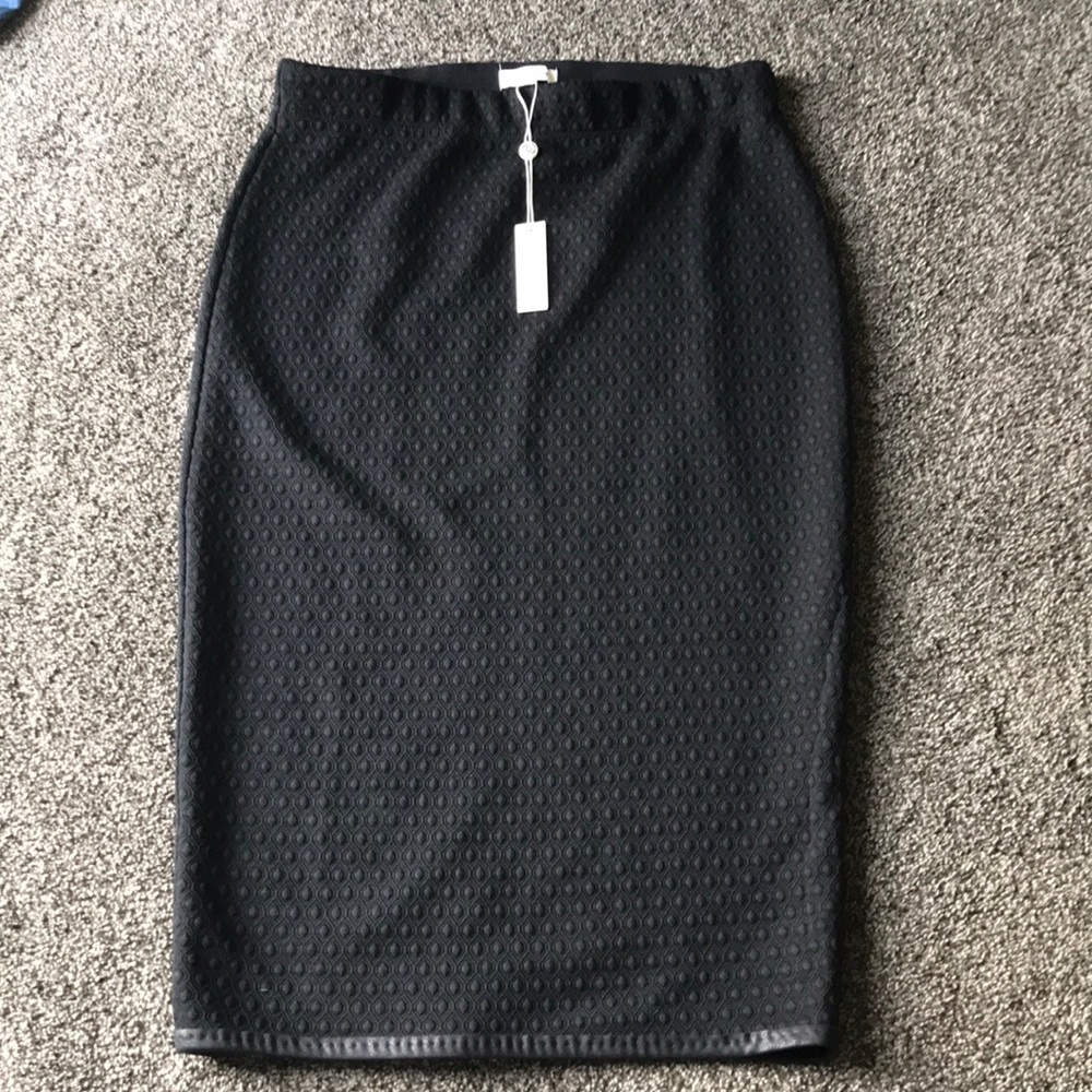 Black below the knee maxi skirt  size S tags on it